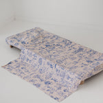 A soft beige and blue daycare sheet set laid out onto a daycare stacker bed. The print features hand drawn outback Australian animals and natives including emu's, crocodiles, kangaroos, koala's, wombats, echidna's with native gum trees and plants. The products are photographed with a white background.